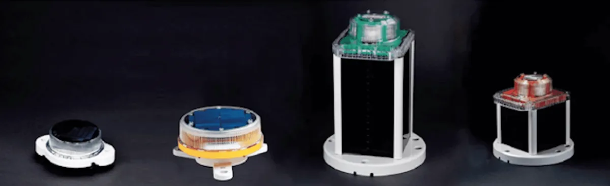 Four marine navigation lanterns, including compact units and taller self-contained models.