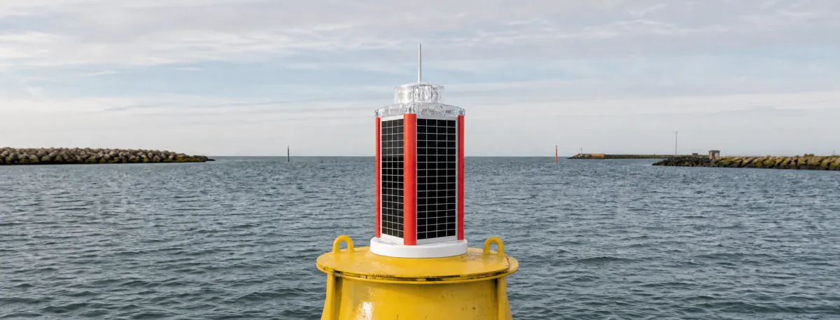 MCL 360 Solar Lantern operating on a yellow navigation buoy in the approach to a Danish harbor.