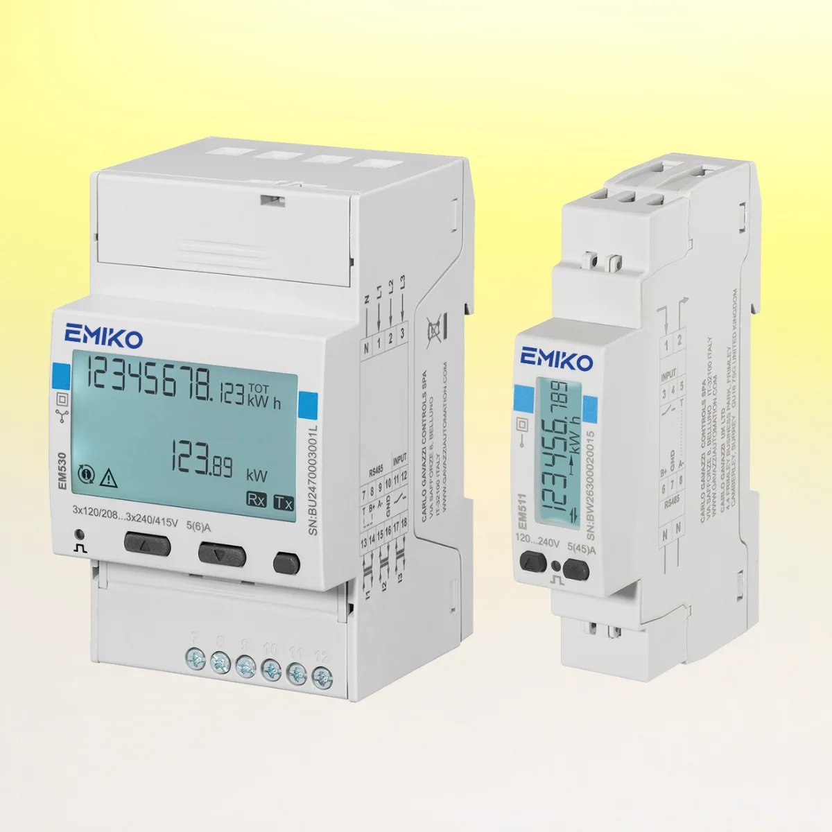 Two EMIKO DIN-rail energy meters side by side: the three-phase EM530 with its large display and the compact single-phase EM511, both showing kilowatt-hour readings.