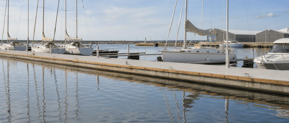 Concrete floating pontoons in calm northern water
