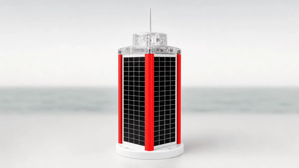 MCL 360 Solar Lantern shown alone with its black solar-panel faces, red corner trim and clear light head.