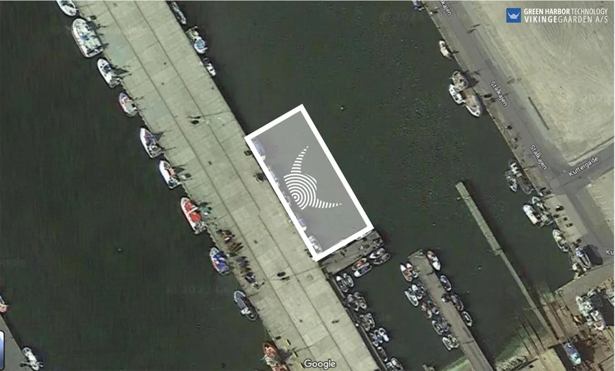 Aerial image of Hanstholm Harbor with the planned floating bridge area marked in white.