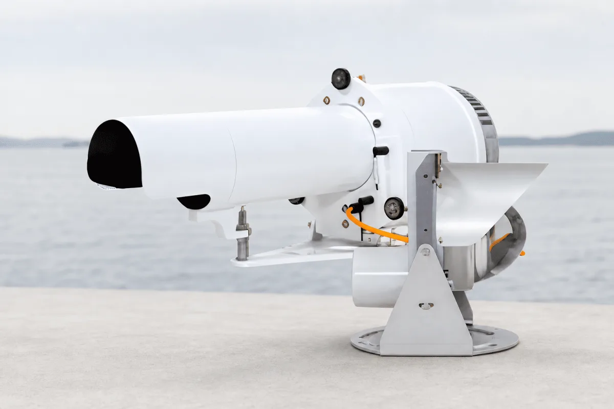 A range and lead light is shown in its white aimable housing on an adjustable bracket.