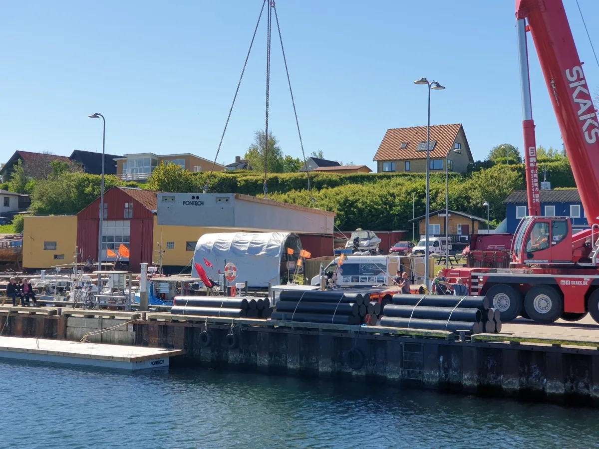 Floating pier at Odden Harbor with fishing boats