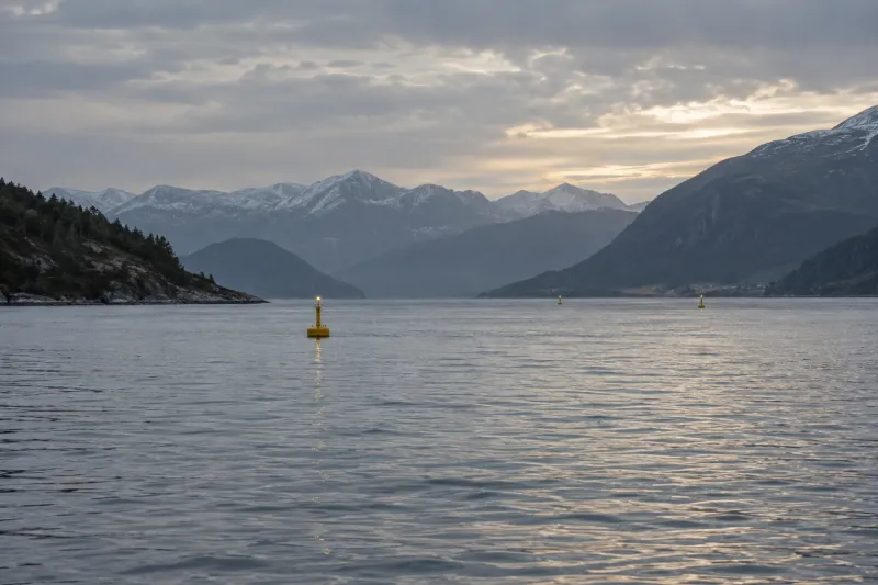 A representative scene for this solution, seen from a distance: Lit navigation buoy